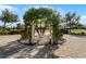 Landscaped garden with arbor and white bench at 4071 Isabella Cir, Windermere, FL 34786