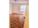 Spacious bedroom with wood-look flooring and a double door closet at 1916 Lake Atriums Cir # 25, Orlando, FL 32839