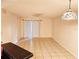 Bright living room with tile floors and sliding glass doors at 1916 Lake Atriums Cir # 25, Orlando, FL 32839