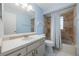 Clean bathroom with light blue walls and a shower/tub combo at 2524 Creekview Cir, Oviedo, FL 32765