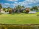 Backyard view of home with pool and canal at 3224 Countryside View Dr, Saint Cloud, FL 34772