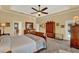 Main bedroom with king bed, ample closet space, and access to bathroom at 3224 Countryside View Dr, Saint Cloud, FL 34772