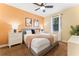 Bright bedroom with a king-size bed and modern decor at 1414 Thunderbird Rd, Davenport, FL 33896