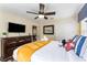 Mickey Mouse themed bedroom with a comfy bed and dresser at 1414 Thunderbird Rd, Davenport, FL 33896
