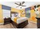 Mickey Mouse themed bedroom with a king-size bed at 1414 Thunderbird Rd, Davenport, FL 33896