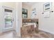 Bathroom with a large soaking tub, and private access to backyard at 1414 Thunderbird Rd, Davenport, FL 33896