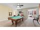 Game room with a pool table and popcorn machine at 1414 Thunderbird Rd, Davenport, FL 33896