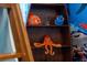 Wooden boat-shaped shelf with Finding Nemo toys at 1414 Thunderbird Rd, Davenport, FL 33896