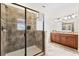 Large walk-in shower with neutral tile and glass door at 1414 Thunderbird Rd, Davenport, FL 33896
