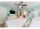 Moana-themed bedroom with a TV and ensuite bathroom at 1414 Thunderbird Rd, Davenport, FL 33896