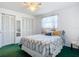 Spacious bedroom with a double bed and large mirrored closet at 2281 E Union Cir, Deltona, FL 32725