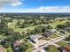 Home situated on a golf course with a large backyard at 2281 E Union Cir, Deltona, FL 32725