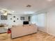 Living room with hardwood floors and a comfy seating area at 2281 E Union Cir, Deltona, FL 32725