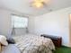 Cozy bedroom featuring a double bed and built-in shelving at 2281 E Union Cir, Deltona, FL 32725