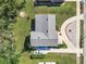Single Gathering home with a large yard and driveway at 2281 E Union Cir, Deltona, FL 32725