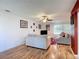 Living room with hardwood floors and ceiling fan at 2281 E Union Cir, Deltona, FL 32725
