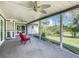 Peaceful screened porch overlooking a lush green yard at 2281 E Union Cir, Deltona, FL 32725