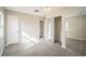 Well-lit bedroom with plush carpeting and mirrored closet doors at 507 Francis Blvd, Lakeland, FL 33801