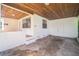 Attached carport with concrete flooring and storage area at 507 Francis Blvd, Lakeland, FL 33801
