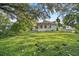 Spacious backyard offering a private and shaded area at 507 Francis Blvd, Lakeland, FL 33801