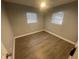 Spacious bedroom with wood-look flooring and neutral walls at 5146 Liming Ave, Orlando, FL 32808