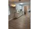 Modern kitchen with white shaker cabinets and granite countertops at 5146 Liming Ave, Orlando, FL 32808