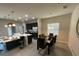 Bright dining area with seating for six and kitchen access at 226 Macaulays Cv, Haines City, FL 33844