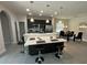 Modern kitchen with an island and stainless steel appliances at 226 Macaulays Cv, Haines City, FL 33844