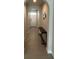 Elegant entryway with tile flooring, console table, and arched doorway at 226 Macaulays Cv, Haines City, FL 33844