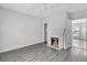 Living room featuring a fireplace and hardwood flooring at 295 S Oak Ave, Bartow, FL 33830