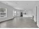 Spacious living area with hardwood floors and multiple windows at 295 S Oak Ave, Bartow, FL 33830