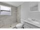Clean bathroom featuring a shower and vanity with modern fixtures at 295 S Oak Ave, Bartow, FL 33830