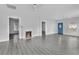 Bright and spacious living area with hardwood floors and fireplace at 295 S Oak Ave, Bartow, FL 33830