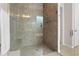 Spa-like bathroom with large shower and built-in bench at 14895 Winkfield Ct, Winter Garden, FL 34787