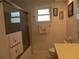 Clean bathroom with shower/tub combo and updated vanity at 11540 Sandy Hill Dr, Orlando, FL 32821