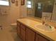 Simple bathroom with single sink vanity and shower/tub combo at 11540 Sandy Hill Dr, Orlando, FL 32821