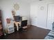 Home office with wood floors and built-in shelving at 11540 Sandy Hill Dr, Orlando, FL 32821