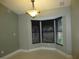 Bright dining area with bay window and chandelier at 11540 Sandy Hill Dr, Orlando, FL 32821