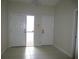 Spacious entryway with tile flooring and two doors at 11540 Sandy Hill Dr, Orlando, FL 32821