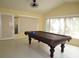 Game room with pool table and lots of natural light at 11540 Sandy Hill Dr, Orlando, FL 32821