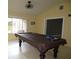 Game room featuring a pool table and adjacent access to other rooms at 11540 Sandy Hill Dr, Orlando, FL 32821