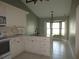 Updated kitchen with white cabinets and island at 11540 Sandy Hill Dr, Orlando, FL 32821