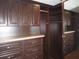 Well-organized walk-in closet with custom built-ins at 11540 Sandy Hill Dr, Orlando, FL 32821