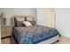 Cozy bedroom with a neutral color scheme and ample space at 2924 Waterlily Way, Poinciana, FL 34759