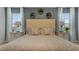 Main bedroom with a neutral color scheme and a tufted headboard at 2924 Waterlily Way, Poinciana, FL 34759