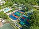 Tennis and pickleball courts with playground at 1100 Sunset View Cir # 203, Reunion, FL 34747