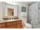 Clean bathroom with shower/tub combo and updated vanity at 1100 Sunset View Cir # 203, Reunion, FL 34747