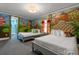 Whimsical bedroom with a candyland mural and two beds at 1021 Fantasy Dr, Davenport, FL 33896