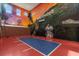 Indoor basketball court with a Hollywood theme at 1021 Fantasy Dr, Davenport, FL 33896