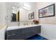 Stylish bathroom with double vanity and hexagonal tile at 1021 Fantasy Dr, Davenport, FL 33896